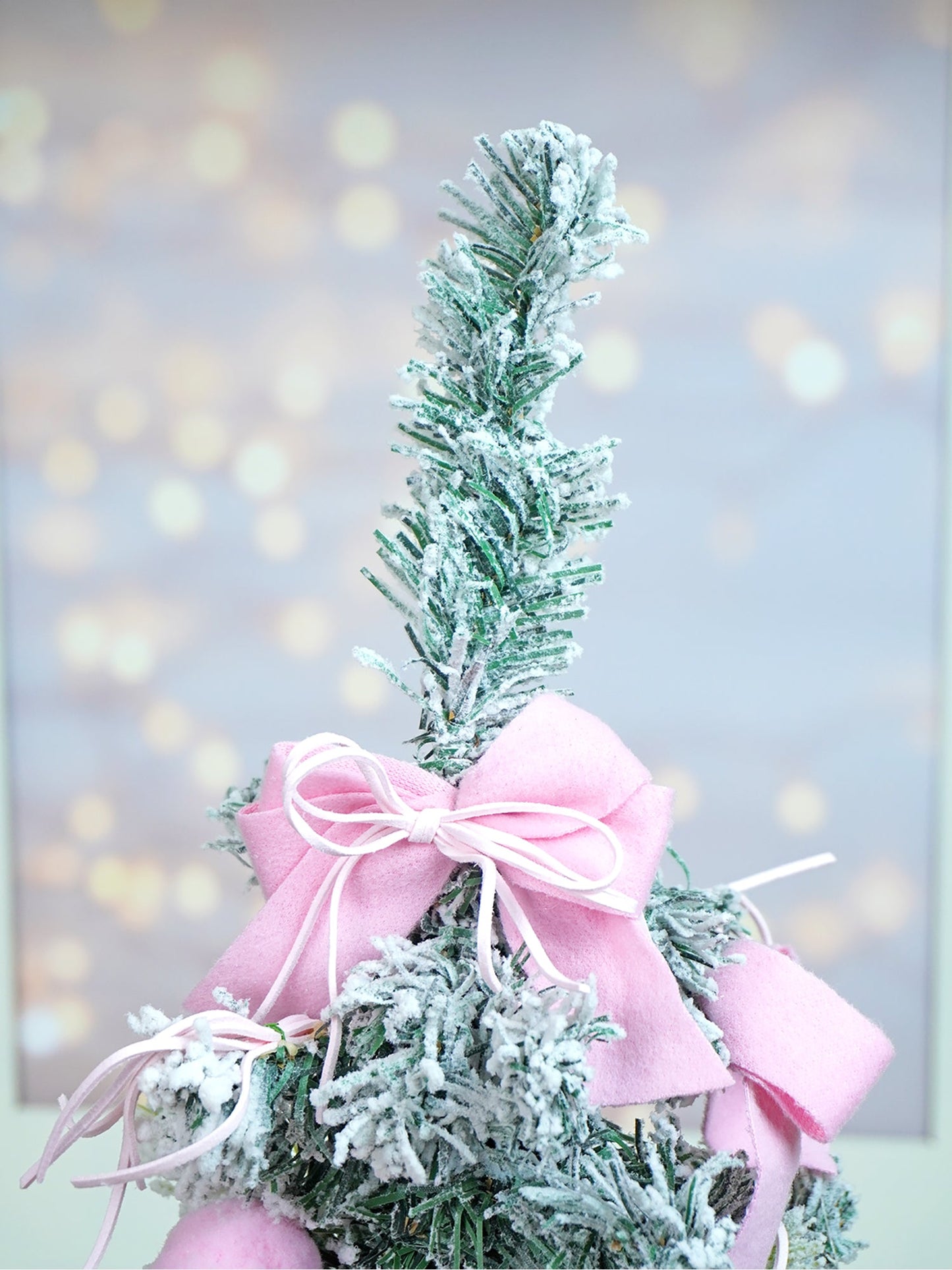 2 feet pastel Pink Swirl Snowy Bushy Christmas Tree filled with balls and ornament Fillers